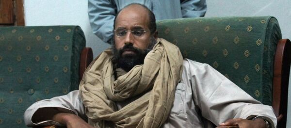 In this Saturday, Nov. 19, 2011 file photo, Seif al-Islam is seen after his capture in the custody of revolutionary fighters in Zintan. - Sputnik Brasil