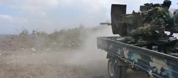 O exército sírio durante um combate no bairro de Salamiya da província de Hama (foto de arquivo) - Sputnik Brasil