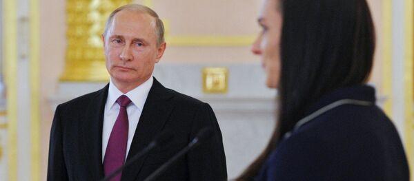 July 27, 2016. Russian President Vladimir Putin and two-time Olympic champion Yelena Isinbayeva during the former's meeting with the national Olympic team before its sendoff to the 2016 Summer Olympics in Rio de Janeiro. The Kremlin. - Sputnik Brasil
