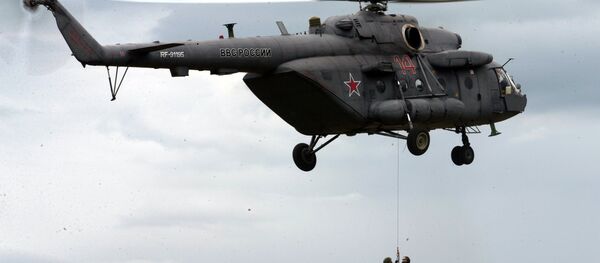 Helicóptero Mi-8 durante os exercícios militares na região de São Petersburgo, Rússia, 2016 - Sputnik Brasil