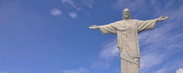 Cristo Redentor vai ser iluminado com as cores verde e amarelo pelos Jogos e pela paz - Sputnik Brasil