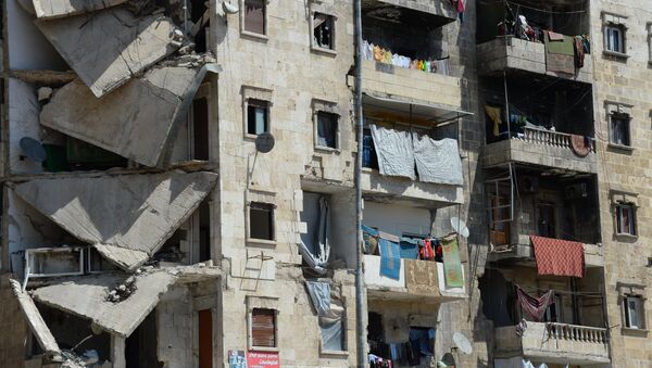 Edifício destruído da cidade síria de Aleppo, abril de 2016, Síria - Sputnik Brasil
