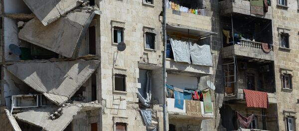 Edifício destruído da cidade síria de Aleppo, abril de 2016, Síria - Sputnik Brasil