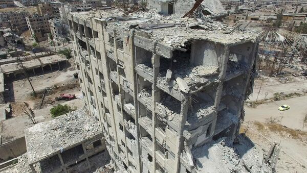A destroyed building in the Bani Zeid district in north Aleppo - Sputnik Brasil