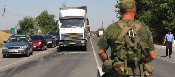 Ponto de controle Armyansk, na fronteira entre a Ucrânia e a Rússia, na península da Crimeia (foto de arquivo) Ponto de controle Armyansk, na fronteira entre a Ucrânia e a Rússia, na península da Crimeia (foto de arquivo) - Sputnik Brasil