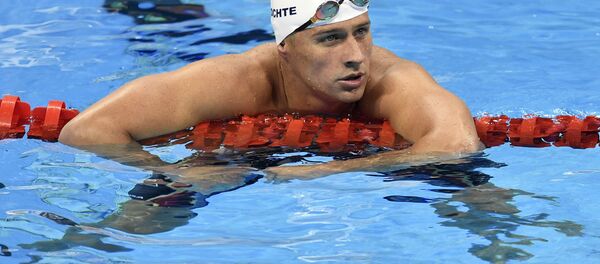 Ryan Lochte depois de um treino de 4x200 em 9 de agosto de 2016, na Olimpíada do Rio 2016 Ryan Lochte depois de um treino de 4x200 em 9 de agosto de 2016, na Olimpíada do Rio 2016 - Sputnik Brasil
