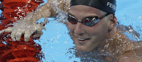 United States James Feigen smiles during a swimming training session prior to the 2016 Summer Olympics in Rio de Janeiro, Brazil United States James Feigen smiles during a swimming training session prior to the 2016 Summer Olympics in Rio de Janeiro, Brazil - Sputnik Brasil