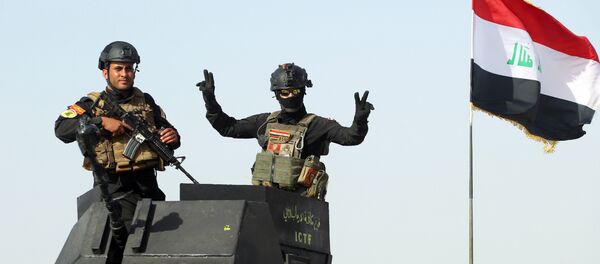 Militares do Serviço antiterrorista iraquiano na província de Al-Anbar (foto de arquivo) Militares do Serviço antiterrorista iraquiano na província de Al-Anbar (foto de arquivo) - Sputnik Brasil