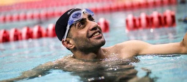 Nos Jogos Paralímpicos, o atleta refugiado sírio Ibrahim vai competir nos 50 e 100 metros nado livre na classe S10 - Sputnik Brasil