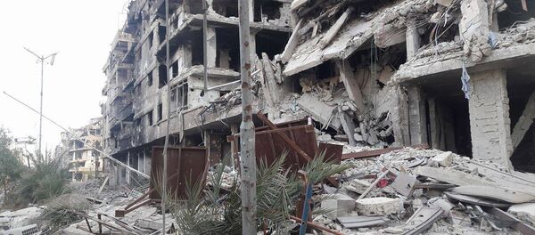 A cidade de Darayya destruída na Síria A cidade de Darayya destruída na Síria - Sputnik Brasil