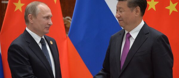 4 de setembro de 2016. O presidente russo, Vladimir Putin, à esquerda, e o presidente chinês, Xi Jinping, durante uma reunião em Hangzhou. - Sputnik Brasil
