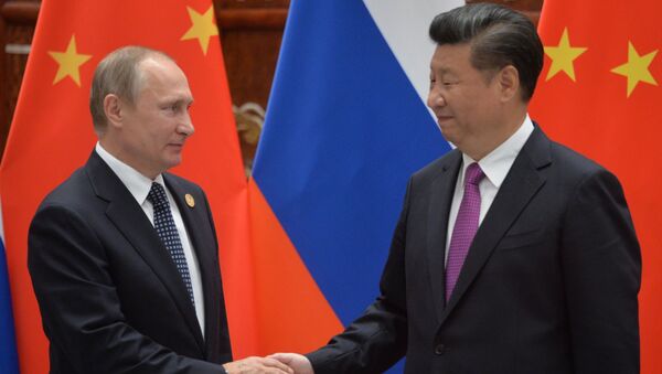 4 de setembro de 2016. O presidente russo, Vladimir Putin, à esquerda, e o presidente chinês, Xi Jinping, durante uma reunião em Hangzhou. - Sputnik Brasil