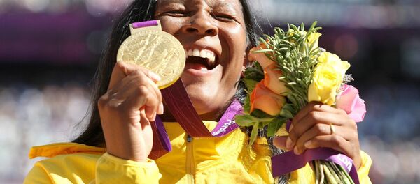 A atleta Shirlene Coelho vence e quebra recorde na final do lançamento de dardo F37 no Estádio Olímpico, em Londres 2012 - Sputnik Brasil