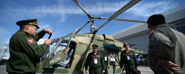 Um helicóptero ligeiro russo Ka-226T no Fórum Internacional Técnico Militar EXÉRCITO 2016 Um helicóptero ligeiro russo Ka-226T no Fórum Internacional Técnico Militar EXÉRCITO 2016 - Sputnik Brasil