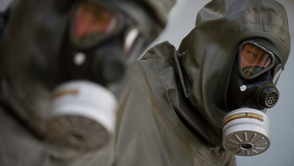Funcionários da GEKA em instalação de eliminação de armas químicas em Munster, Alemanha, 30 de outubro de 2013 (imagem referencial) - Sputnik Brasil