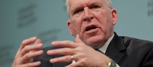 This March 11, 2014 file photo shows CIA Director John O. Brennan speaking in Washington. The CIA's insistence that it did not spy on its Senate overseers collapsed July 31 with the release of a stark report by the agency's internal watchdog documenting improper computer surveillance and obstructionist behavior by CIA officers. Those internal conclusions prompted Brennan to abandon months of defiance and defense of the agency and apologize to Senate intelligence committee leaders. - Sputnik Brasil