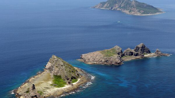 Grupo de ilhas disputadas no mar do Sul da China: Uotsuri, Minamikojima e Kitakojima denominados Senkaku no Japão e Diaoyu na China (foto de arquivo) - Sputnik Brasil