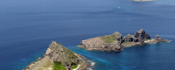 Grupo de ilhas disputadas no mar do Sul da China: Uotsuri, Minamikojima e Kitakojima denominados Senkaku no Japão e Diaoyu na China (foto de arquivo) - Sputnik Brasil