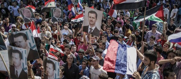 Protesto de apoio ao presidente sírio Bashar Assad - Sputnik Brasil