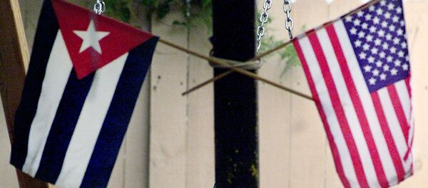 Bandeiras dos EUA e da Cuba - Sputnik Brasil