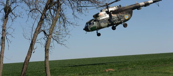 Helicóptero das Forças Armadas da Ucrânia na vila de Dolina na região de Donetsk, 2014 (foto de arquivo) - Sputnik Brasil