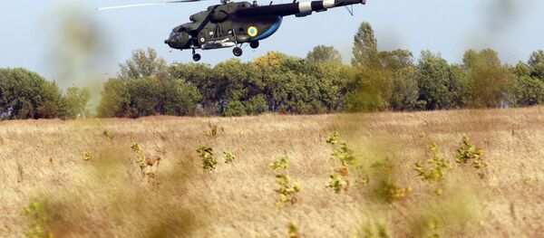 Helicptero ucraniano perto da froneira de Donbass (arquivo) - Sputnik Brasil