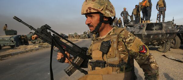 Forças iraquianas na área de al-Shourah, a 45 quilómetros da cidade de Mossul, avançando em direção à cidade, 17 de outubro de 2016 - Sputnik Brasil