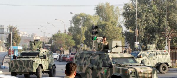 Veículos blindados das forças peshmerga no local de ataque do Daesh na província de Kirkuk no norte do Iraque, 21 de outubro de 2016 - Sputnik Brasil