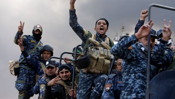 Forças de segurança iraquianas durante operação contra extremistas em Mossul, Iraque, 19 de outubro de 2016 - Sputnik Brasil