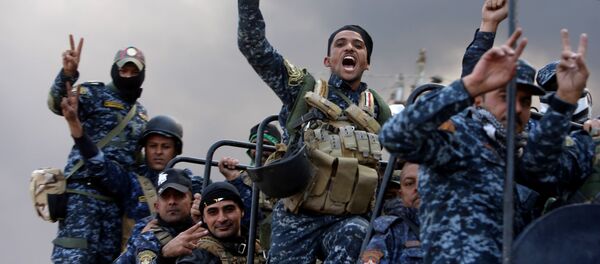 Forças de segurança iraquianas durante operação contra extremistas em Mossul, Iraque, 19 de outubro de 2016 - Sputnik Brasil