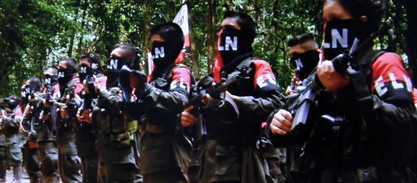 Combatentes do ELN (foto de arquivo) Combatentes do ELN (foto de arquivo) - Sputnik Brasil