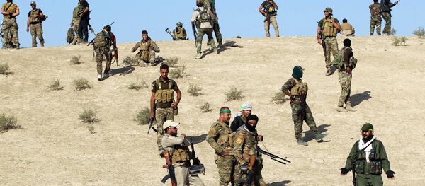 Combatentes xiitas avançam em direção de Salmani, a sul de Mossul, Iraque, 30 de outubro de 2016 - Sputnik Brasil
