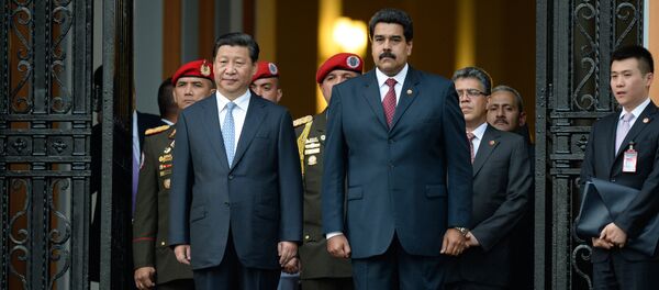 Presidente chinês Xi Jinping com o presidente venezuelano Nicolás Maduro durante a sua visita a Caracas, Venezuela, julho de 2014 (foto de arquivo) - Sputnik Brasil