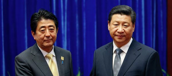 Shinzo Abe e Xi Jinping - Sputnik Brasil