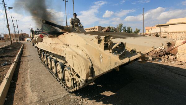 Military vehicles of Iraqi army take part in an operation against Islamic State militants in Qaraqosh, near Mosul, Iraq, November 2, 2016 - Sputnik Brasil