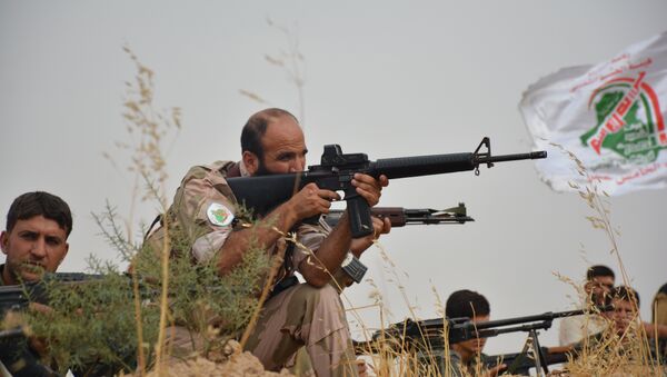 Combatentes da milícia Hasdi Sabi durante a operação militar em Mossul, Iraque, novembro de 2016 - Sputnik Brasil