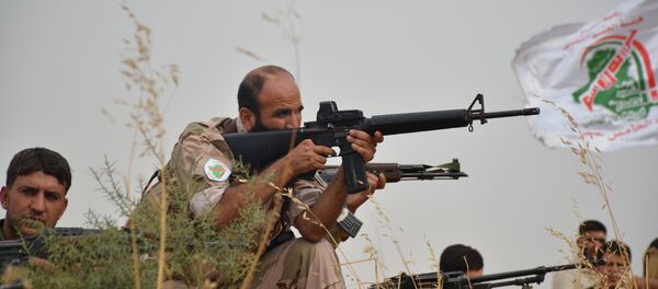 Combatentes da milícia Hasdi Sabi durante a operação militar em Mossul, Iraque, novembro de 2016 - Sputnik Brasil