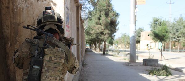 Soldado do exército afegão durante combates contra o Talibã, foto de arquivo - Sputnik Brasil