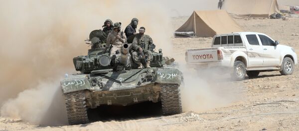 Exército sírio libertou dos militantes a cidade El-Karyatein - Sputnik Brasil