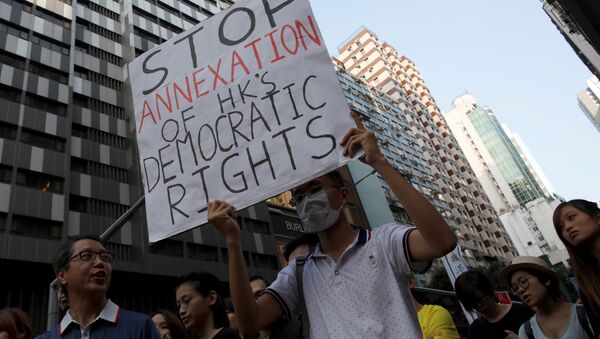 Manifestantes protestam contra a interferência de Pequim na política local de Hong Kong, 6 de novembro de 2016 - Sputnik Brasil