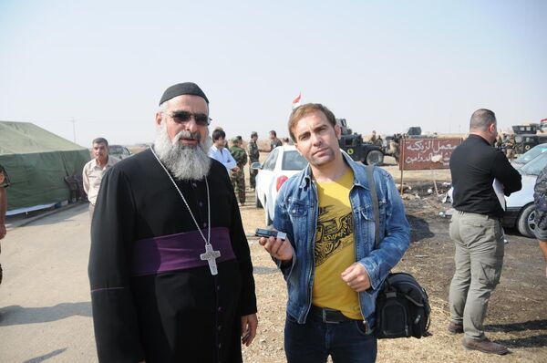 Representante da comunidade cristã de Mossul durante uma entrevista, 11 de novembro de 2016 - Sputnik Brasil