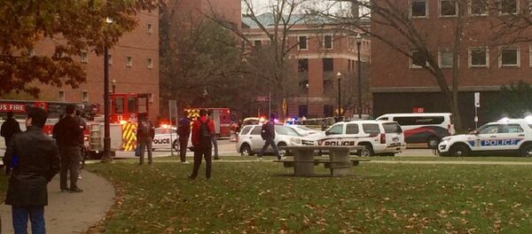 Police cars, fire truck and ambulance line 19th and College avenues near location where active shooter was reported - Sputnik Brasil