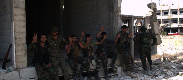 Os soldados do Exército Árabe Sírio - Sputnik Brasil