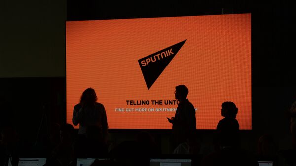 Tela com o logo da Sputnik Internacional - Sputnik Brasil