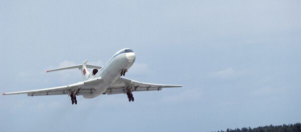 Самолет Ту-154 в воздухе - Sputnik Brasil