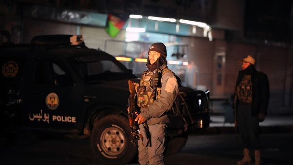 Policial afegão está a guarda no local da explosão em Kandahar,10 de janeiro de 2017 - Sputnik Brasil