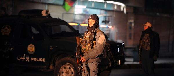 Policial afegão está a guarda no local da explosão em Kandahar,10 de janeiro de 2017 - Sputnik Brasil