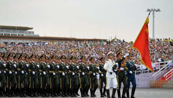 Soldiers of China's People's Liberation Army (PLA) march during a rehearsal for a military parade in Beijing - Sputnik Brasil