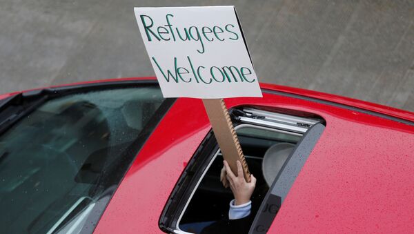 Protestos por refugiados nos EUA - Sputnik Brasil