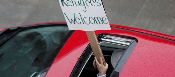 Protestos por refugiados nos EUA - Sputnik Brasil
